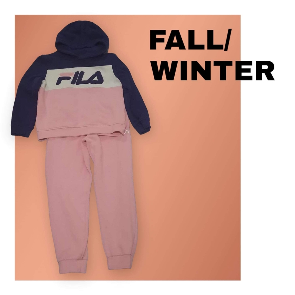 Fila track suit.size 8.Color pink/.navy blue.
